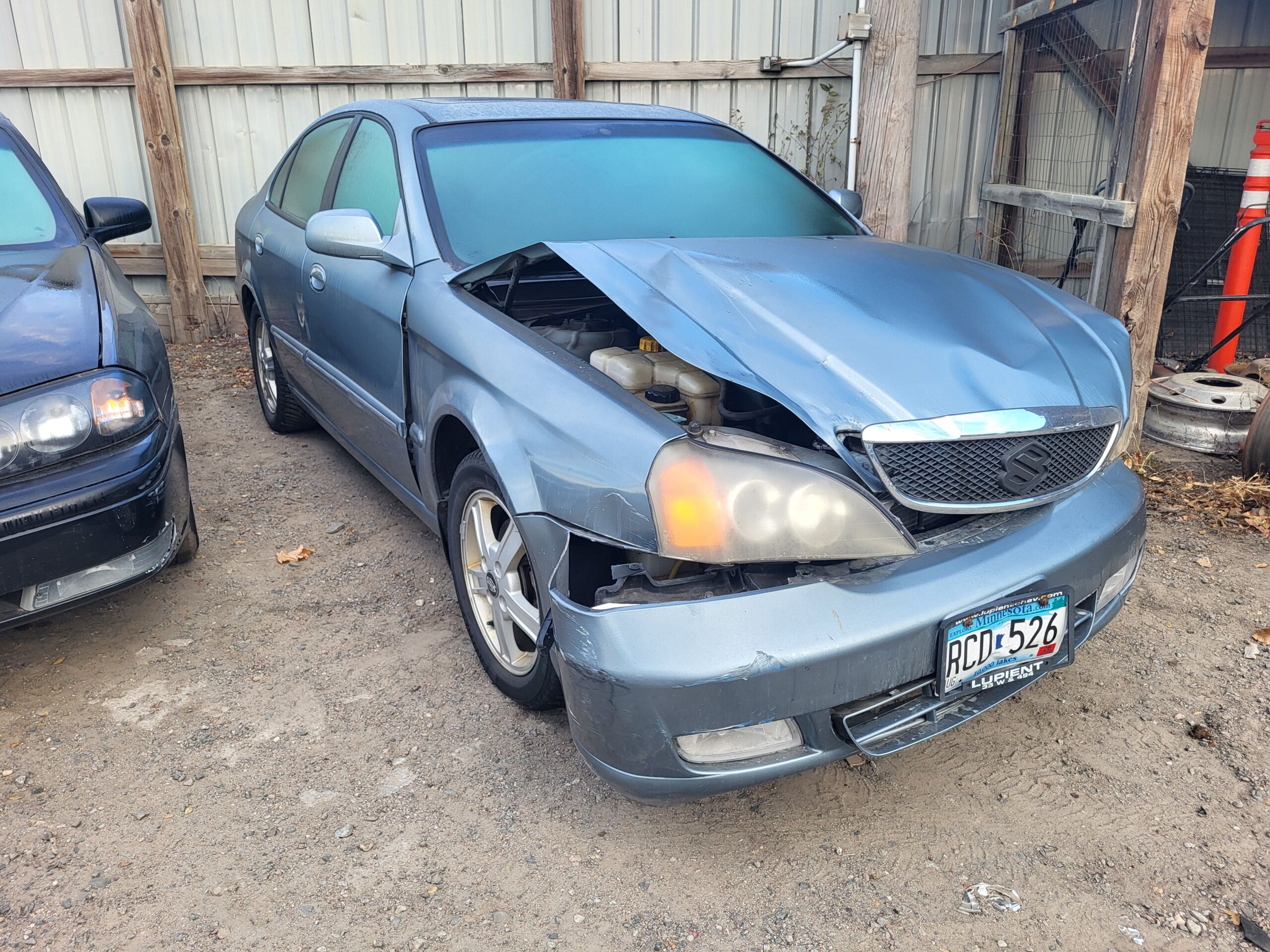 20251124_082151 2004 Suzuki Verona (Gray)